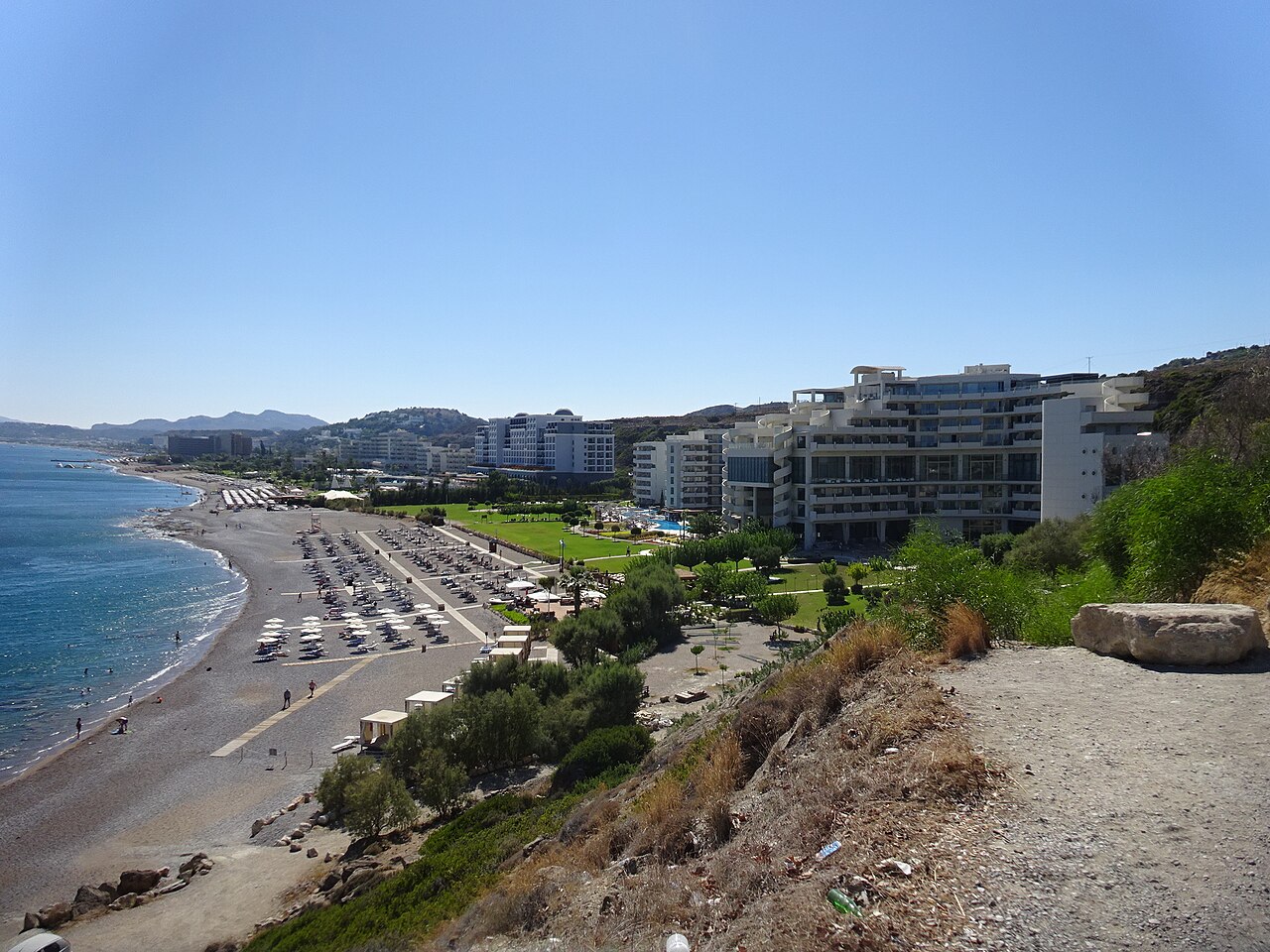 Beachfront hotels along Faliraki Beach, Rhodes &mdash; tourism infrastructure within the storm retreat envelope