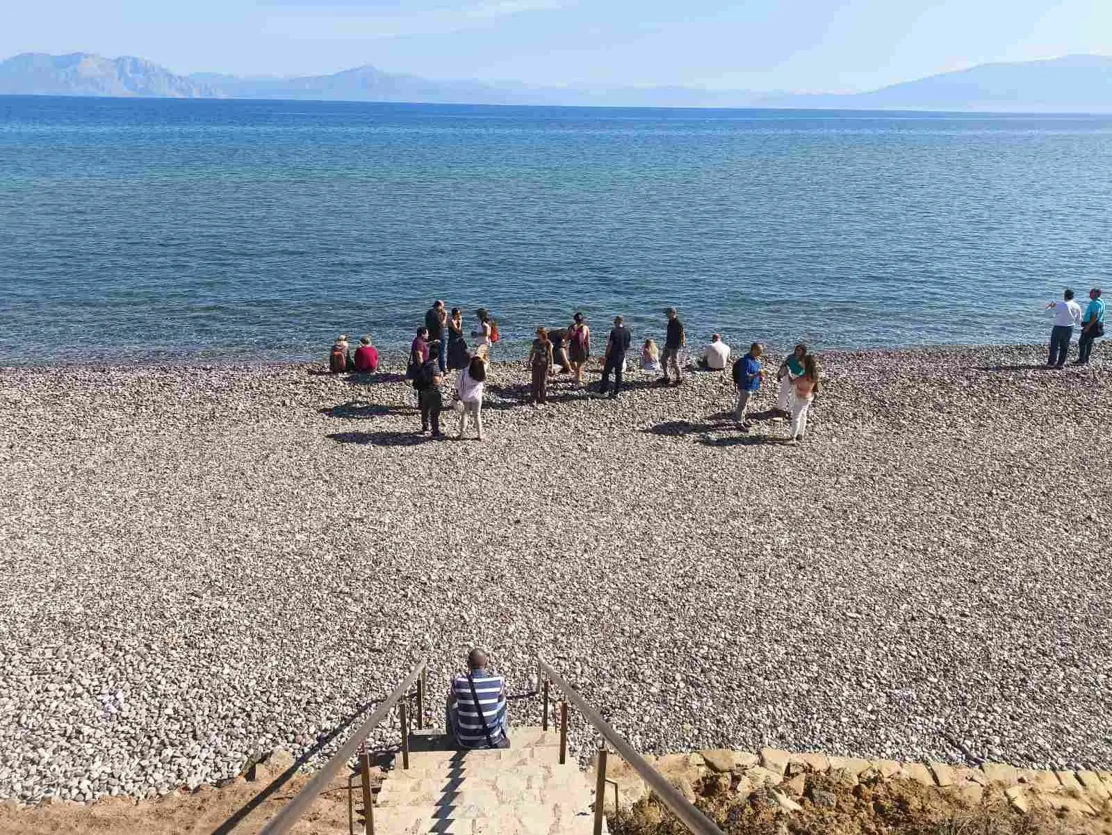 Visitors on the pebble beach at Kalamaki, West Achaea, site of the LIFE-IP AdaptInGR coastal protection works