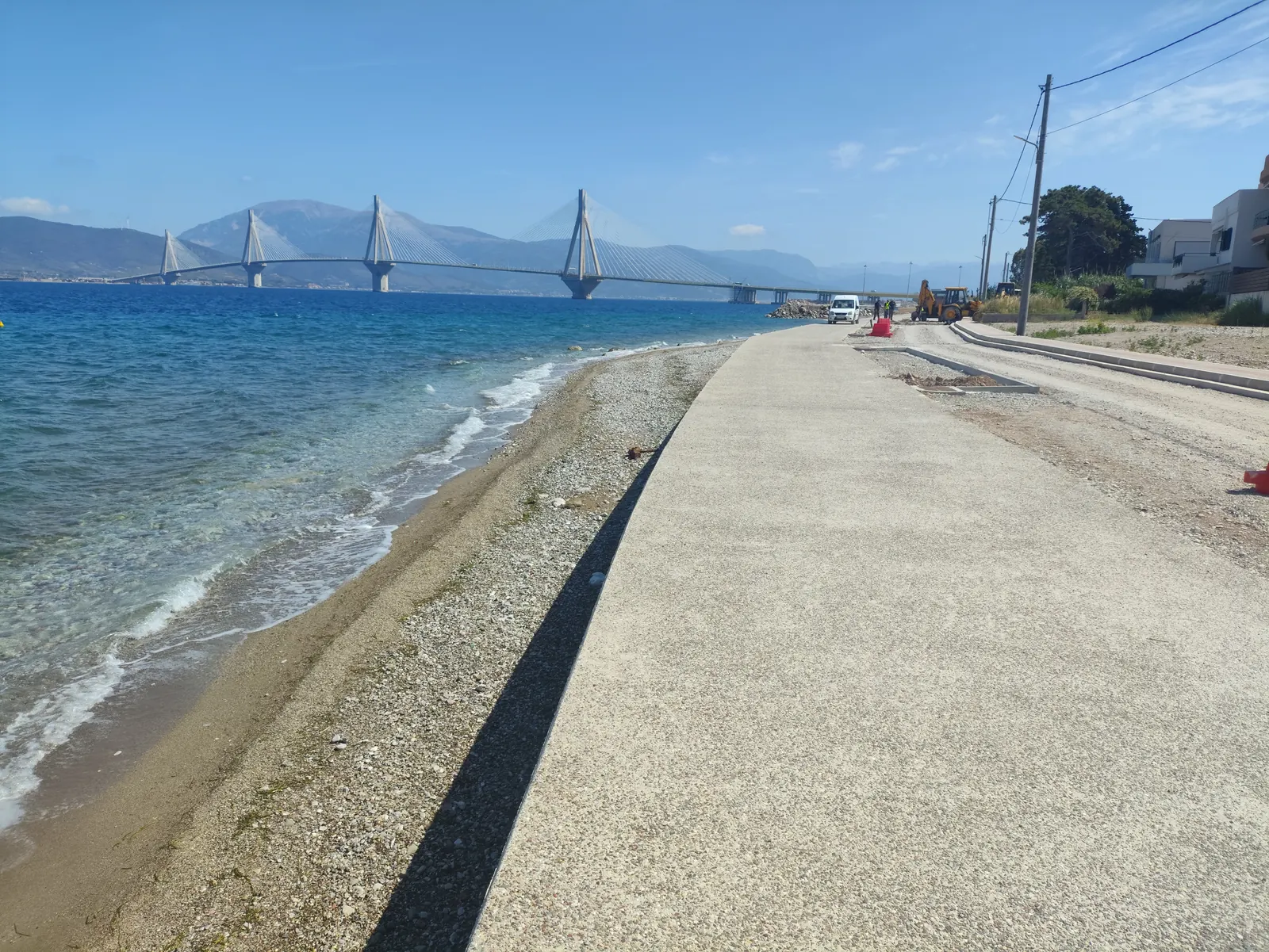 Coastal zone works in progress at Rio-Aktaio, Achaea, with the Rio-Antirrio bridge across the Gulf of Corinth